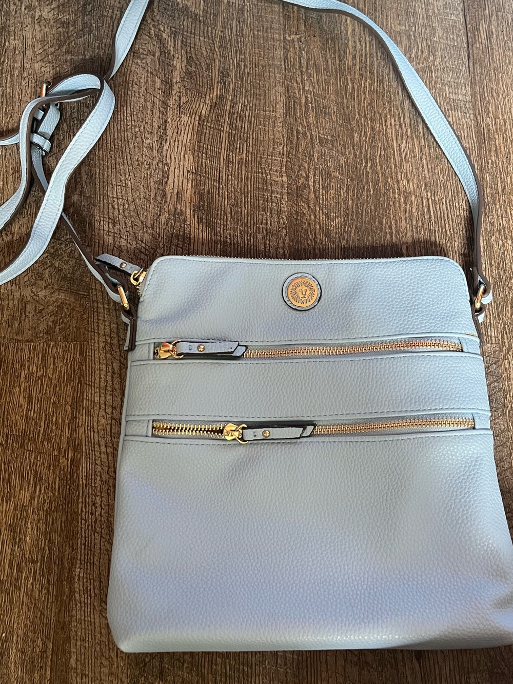 Light Blue Crossbody Bag with Gold Accents